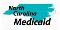 A blue and white logo for north carolina medicaid.